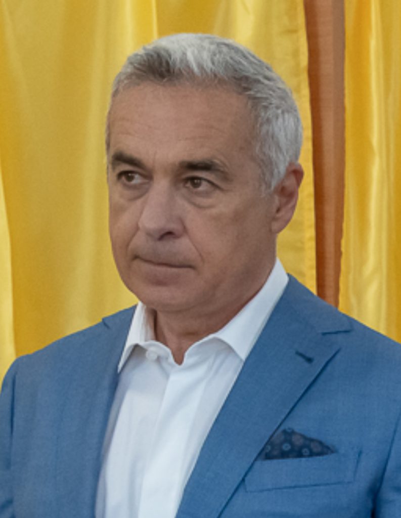 George Simion and Călin Georgescu vote together at a school in Mogoșoaia in the first round of the 2025 presidential elections