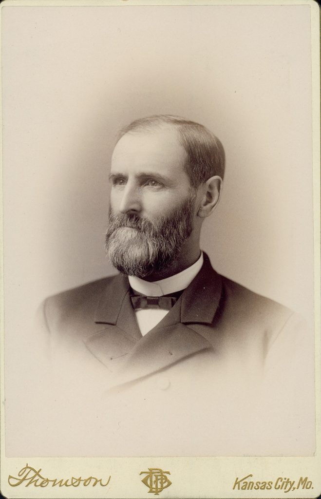 Bust portrait of Captain David Ellison wearing a suit and bow tie, with his head turned to the left. "Thomson" and "Kansas City, Mo." (printed below image).