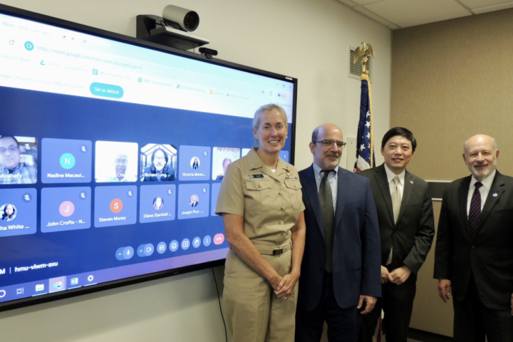 Vice Admiral Nancy Hann, Ben Friedman, Sen Chiao, and Rick Spinrad at the signing of a  Letter of Intent between NOAA and the Educational Partnership Program wi